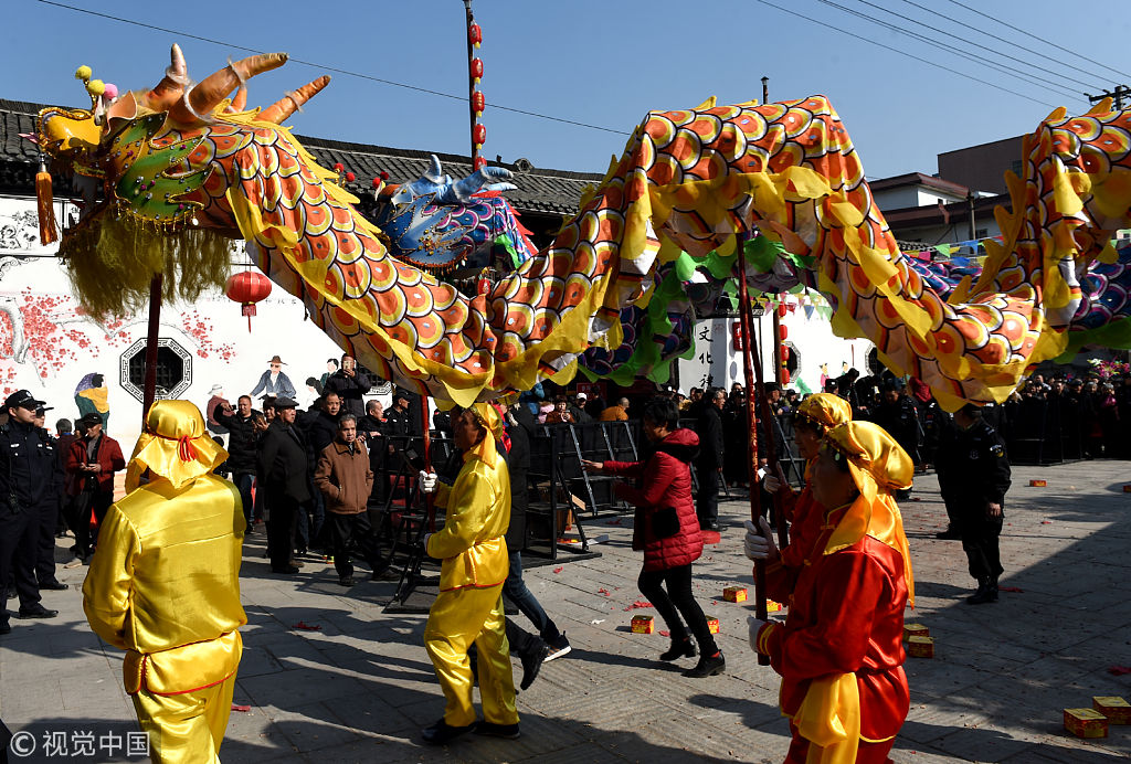 浙江义乌举行传统民俗文化节喜迎新年