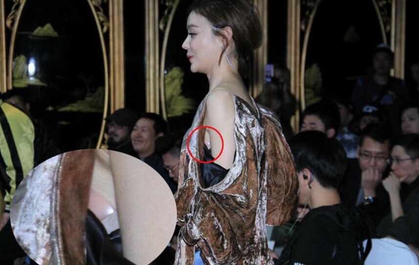 陈好给人的感觉是故意让吊带滑落,似乎是早已发现了吊带的魅力,露遮